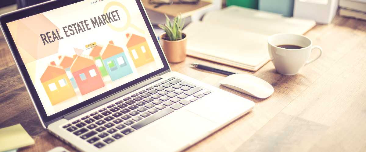 photo of a computer ranking on Google for real estate market