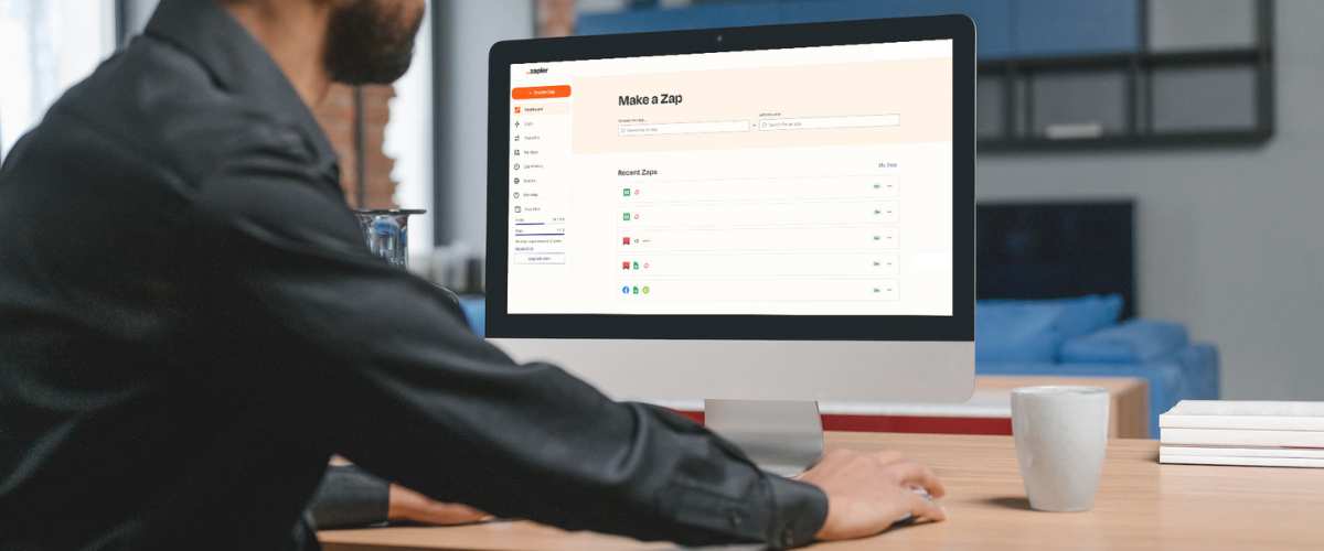 photo of computer with a realtor creating a zap with Zapier to automate lead generation